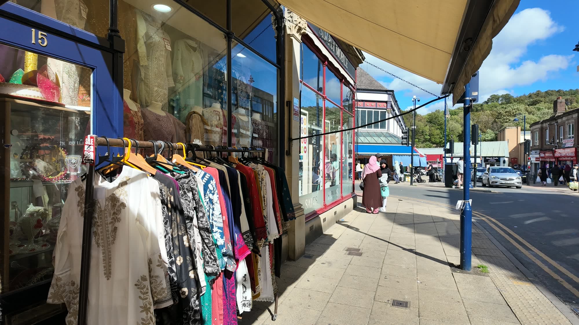 Clothing rails outside independent shops on a Dewsbury street