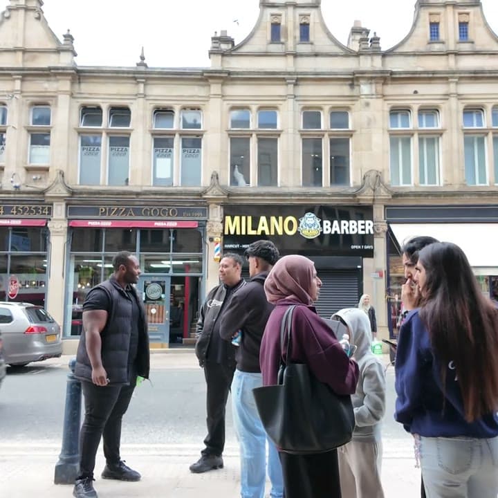 A barber's shopfront on the Dewsbury street